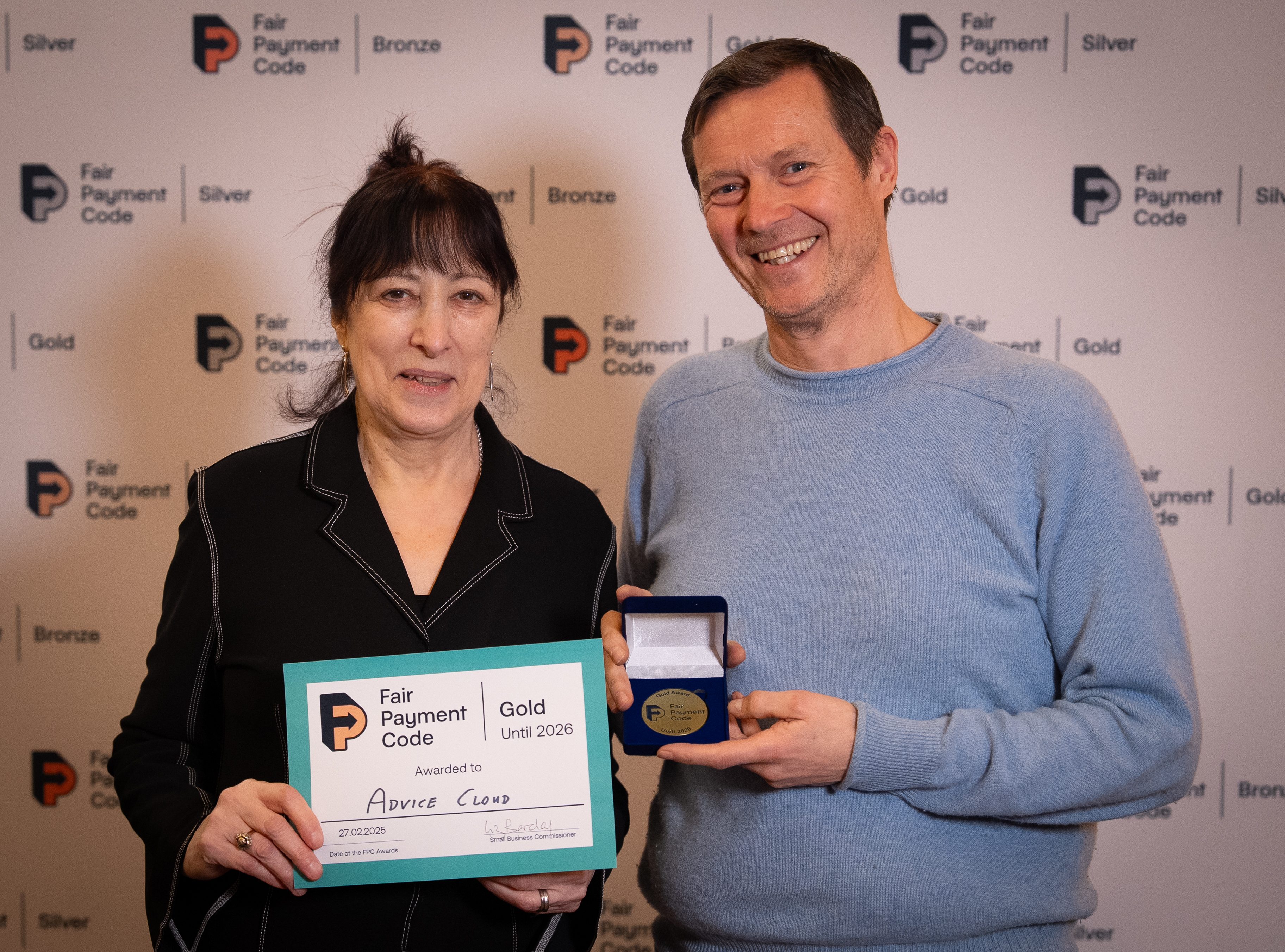 Chris Farthing, Advice Cloud CEO and Founder, accepting the Financial Payment Code Gold Award from Liz Barclay, Small Business Commissioner