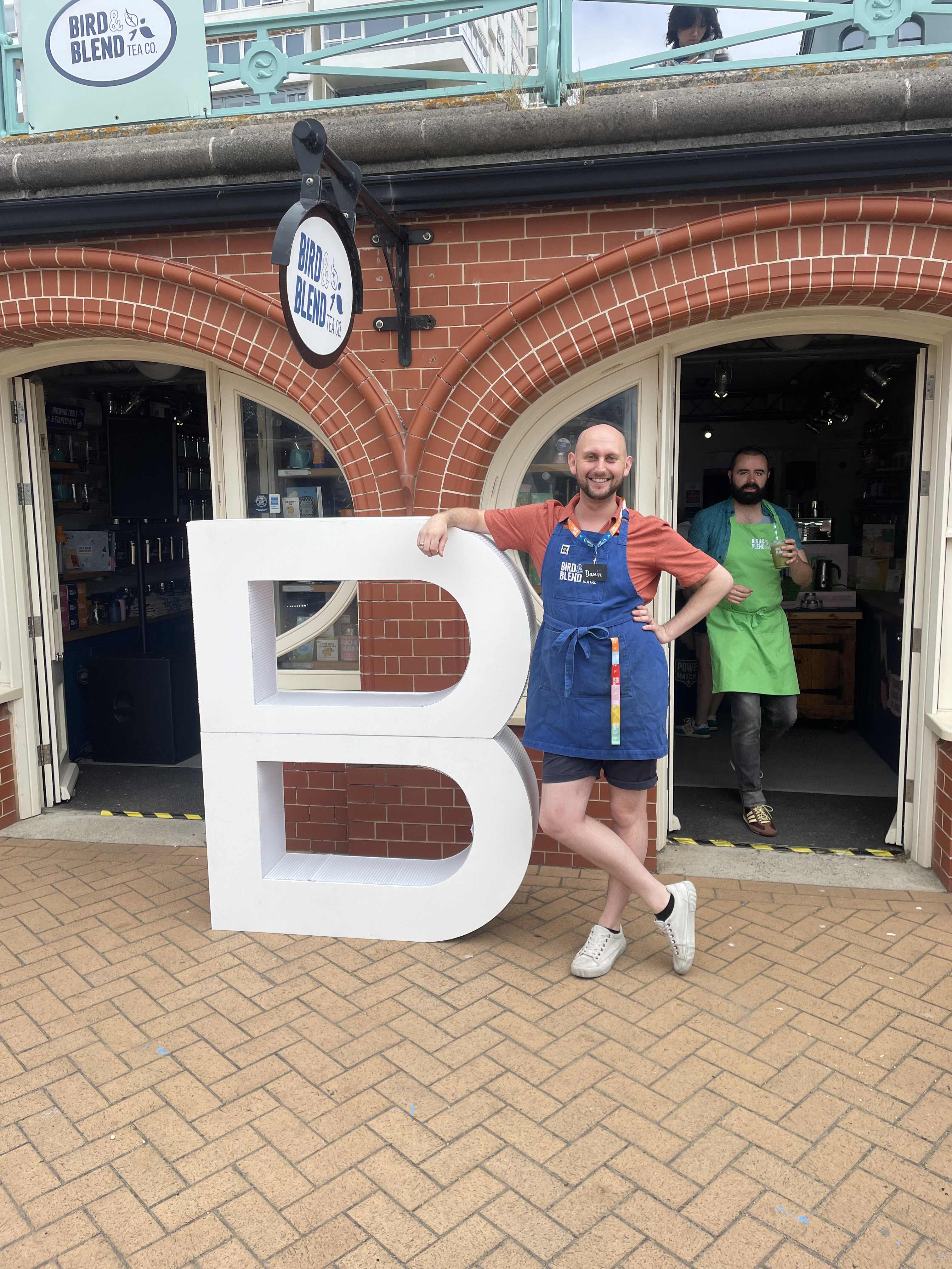 Brighton Store TEAm members with B Lab UK's Big B for B Corp in June celebrating Bird & Blend's 13th Birthday