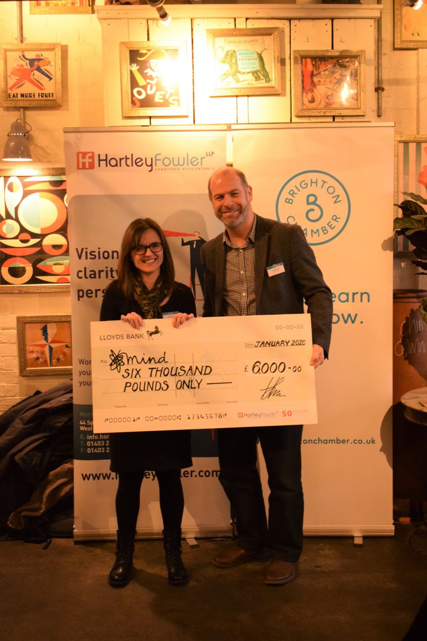 Hartley Fowler presenting Mind with a cheque as their chosen charity of 2019.